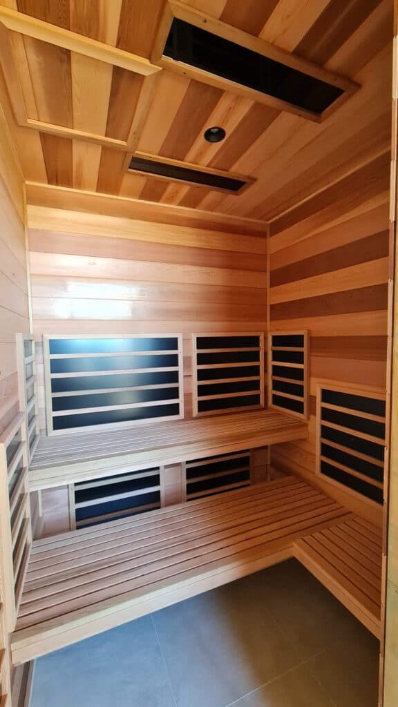 Detailed cedar joinery during sauna fabrication