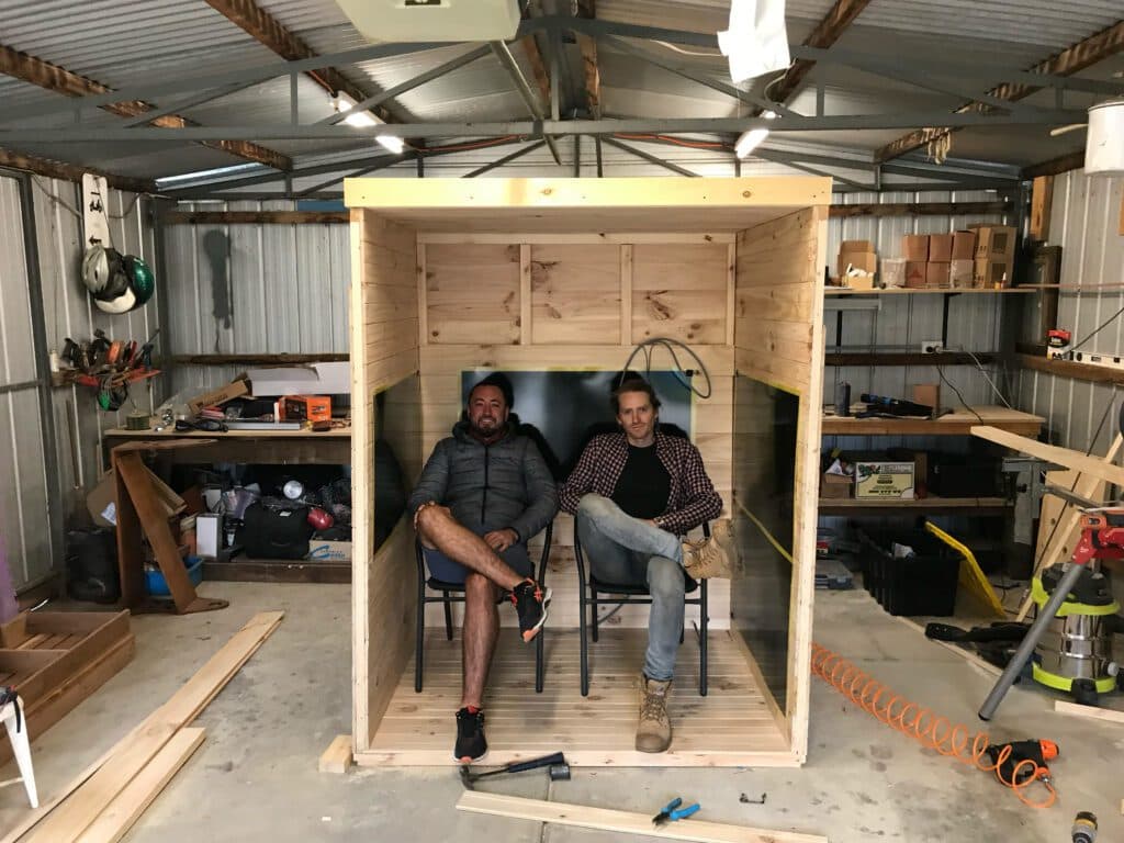 SaunaCloud team reviewing a custom sauna build