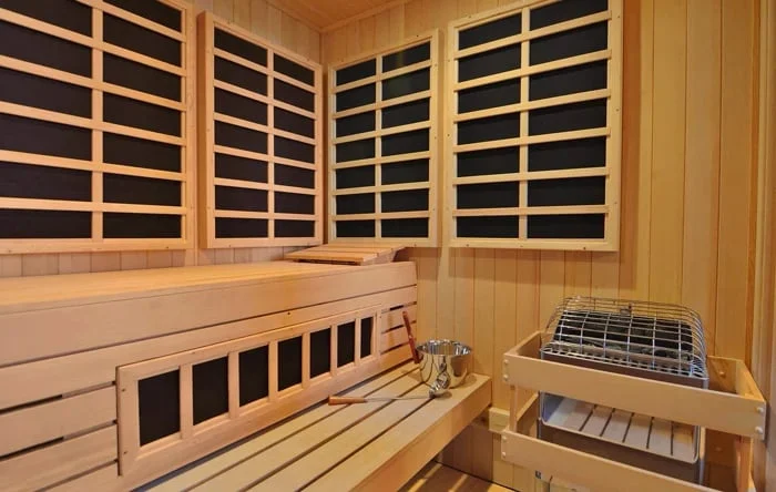 Infrared sauna side effects guide — normal responses vs preventable problems vs genuine concerns