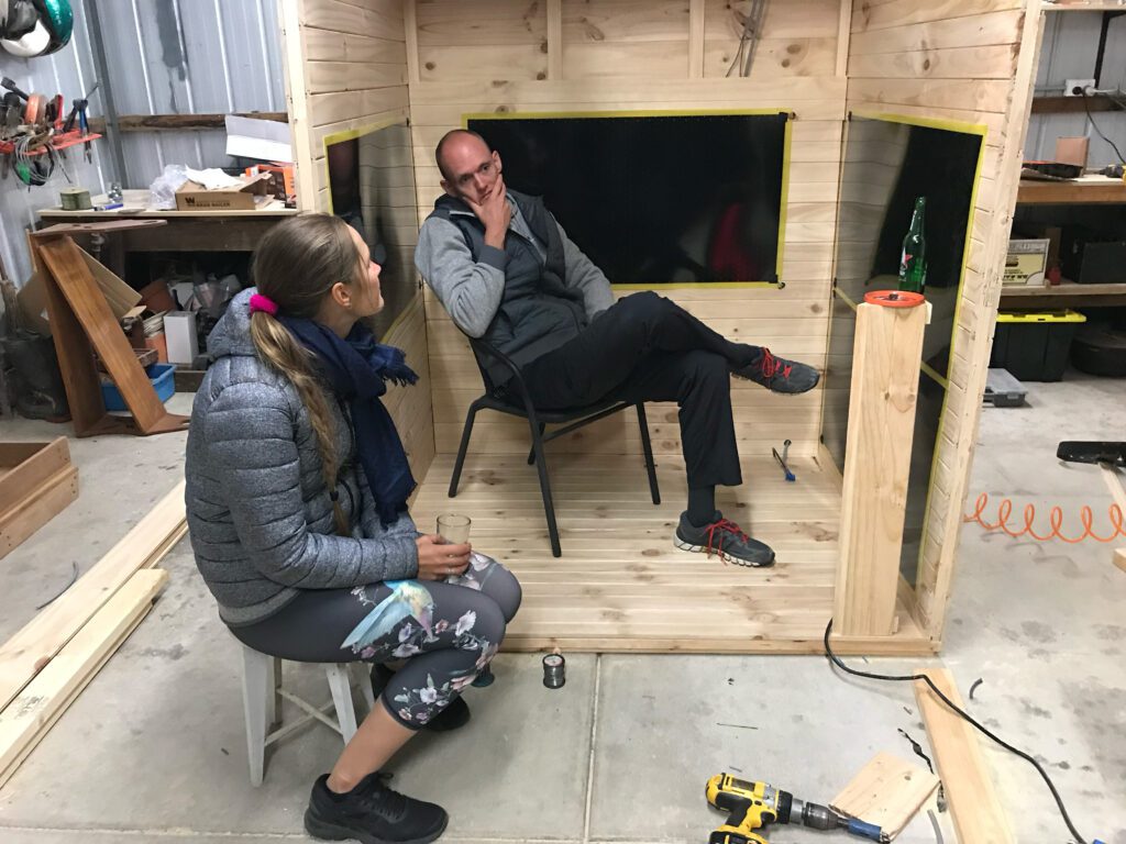 Martijn and Daryna inspecting a finished sauna